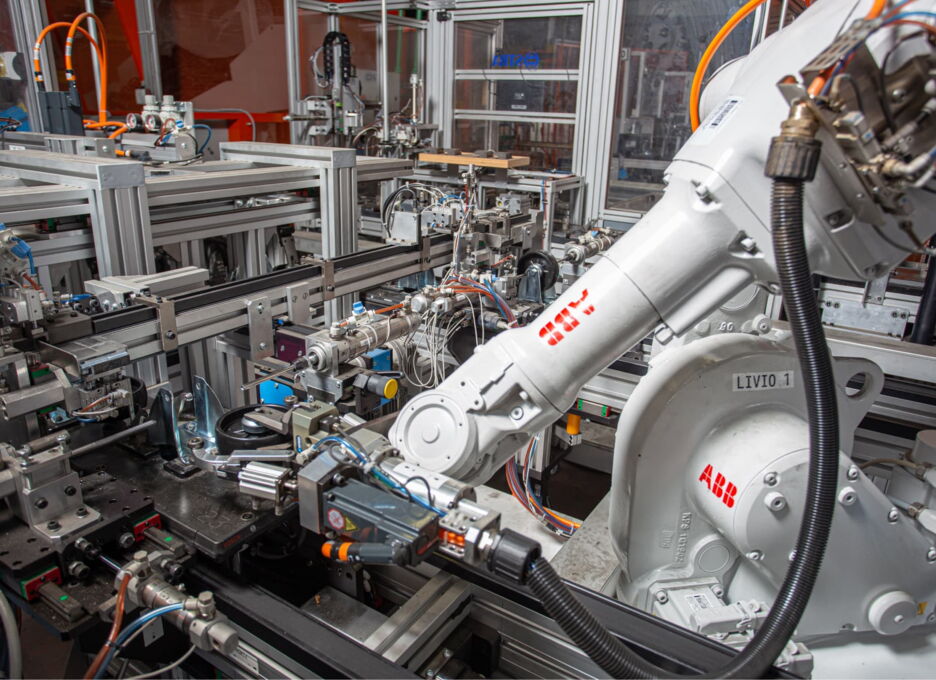 ABB robot in an automated castor assembly cell