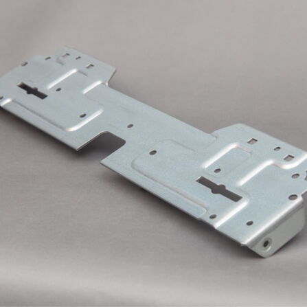 Zinc-plated stamped steel bracket with slots