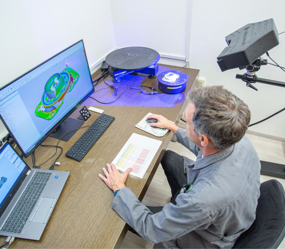 LIV engineer measuring a part with a 3D scanner