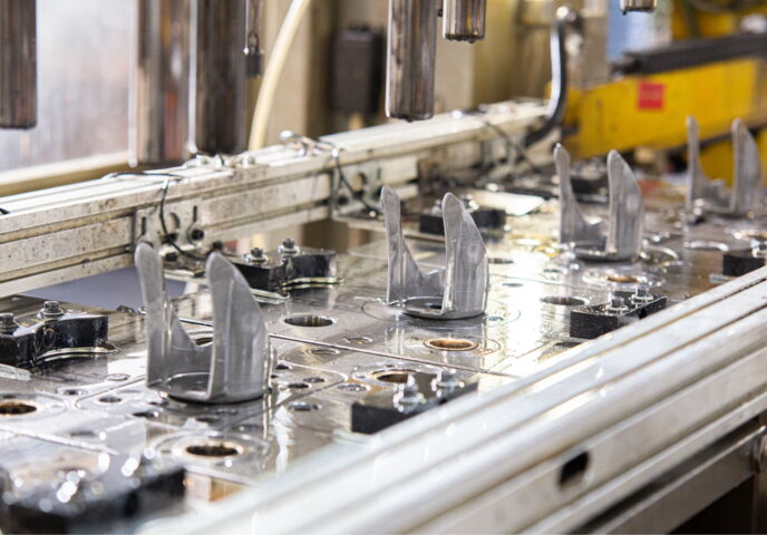 Transfer press tool forming steel castor fork parts
