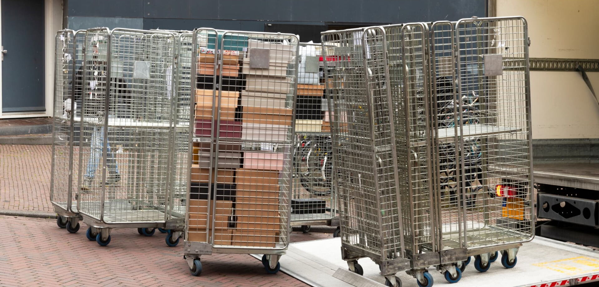 Roll container wheels
