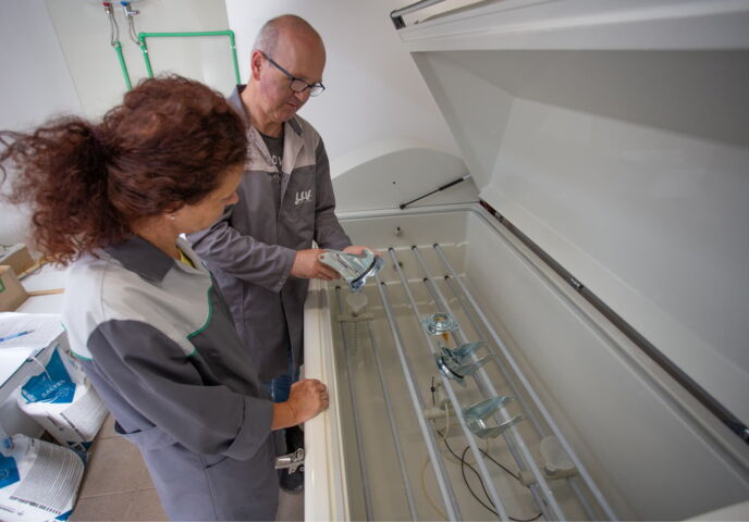 LIV engineers inspecting parts in production