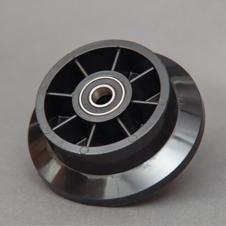 Black plastic pulley wheel with ball bearing