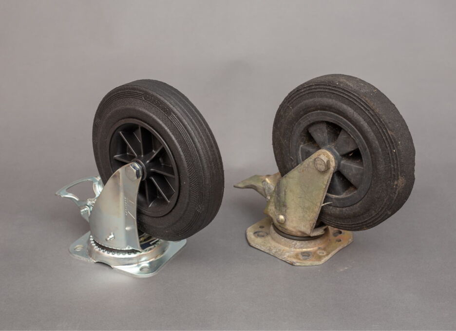 New and worn waste container castors side by side
